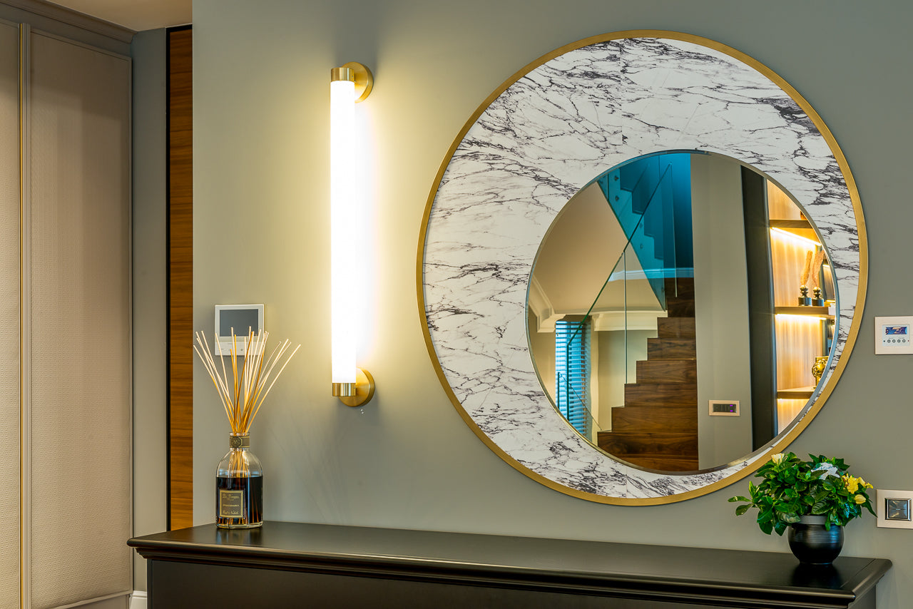 Cum alegi oglinda perfectă pentru livingul tău?